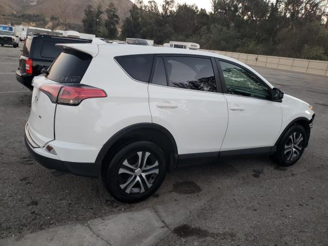 Image 3 of 2018 TOYOTA RAV4 LE 2018 with VIN JTMZFREV2JJ167325