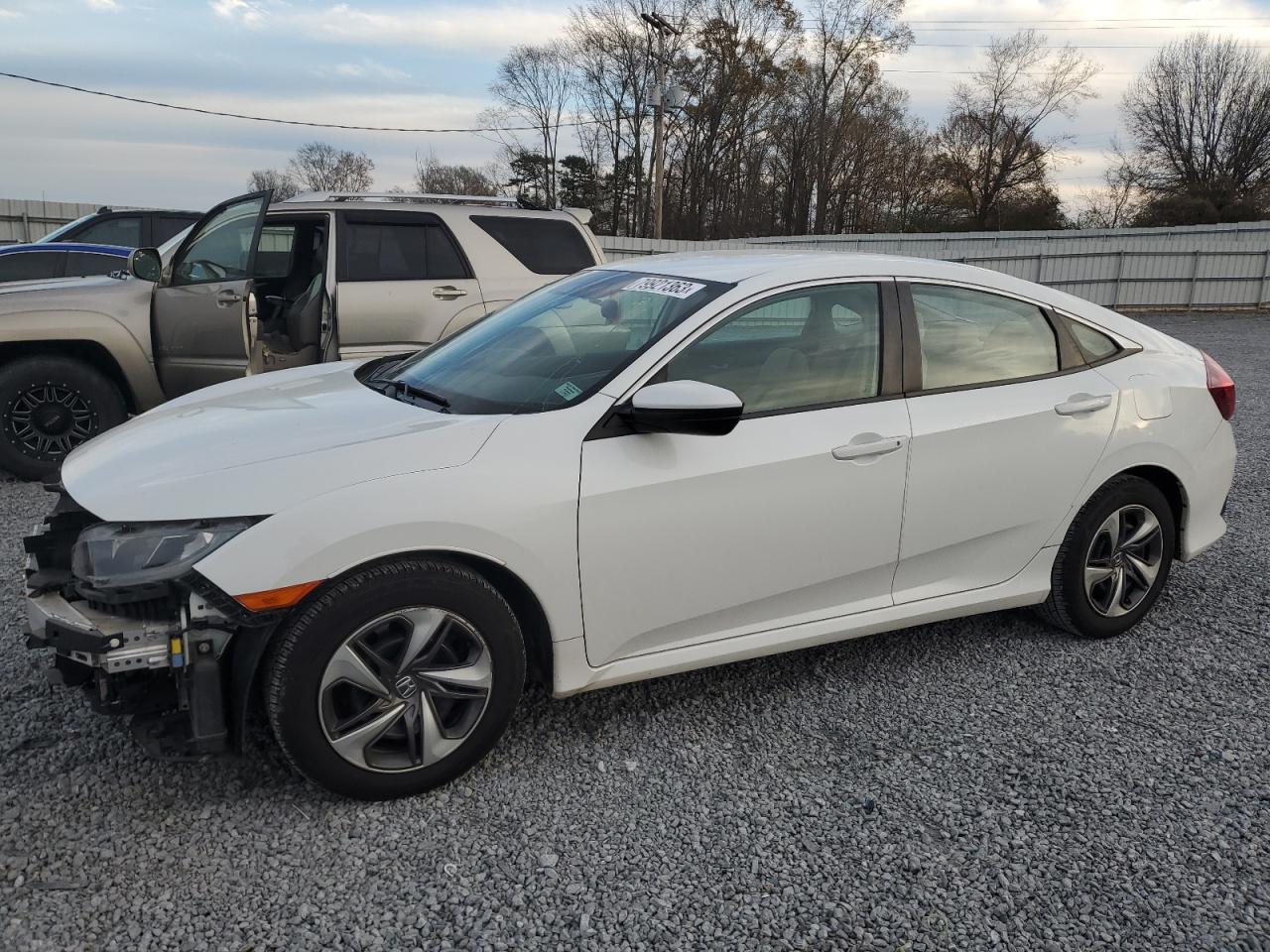 Изображение 1 2019 HONDA CIVIC LX 2019 с VIN 19XFC2F63KE038499