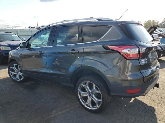 Image 2 of 2017 FORD ESCAPE TITANIUM 2017 with VIN 1FMCU9J90HUF09444