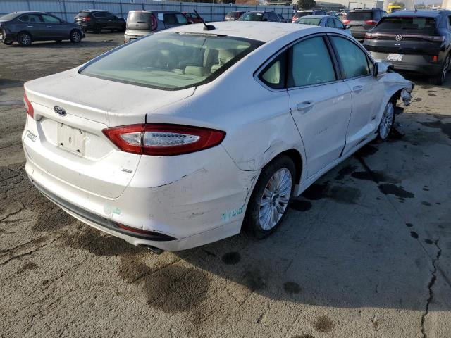 Image 3 of 2015 FORD FUSION SE PHEV 2015 with VIN 3FA6P0PU8FR128693