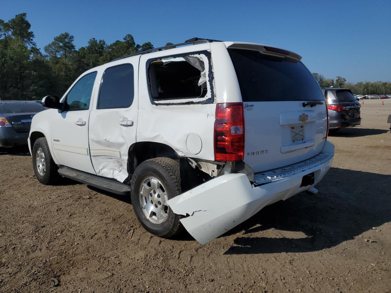 Изображение 2 Chevrolet Tahoe C1500 Ls 2012 с VIN 1GNSCAE05CR172661