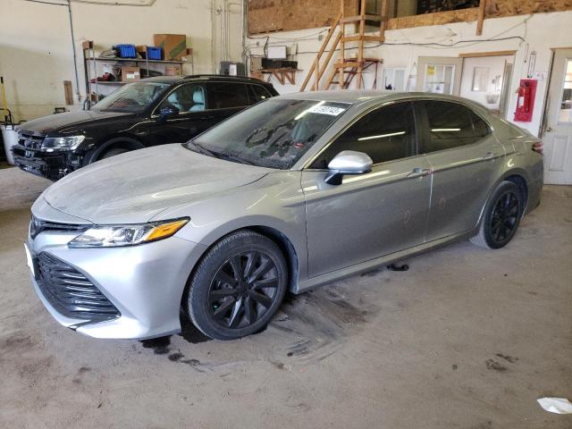 Image 1 of 2020 TOYOTA CAMRY LE 2020 with VIN 4T1C11AK7LU999869
