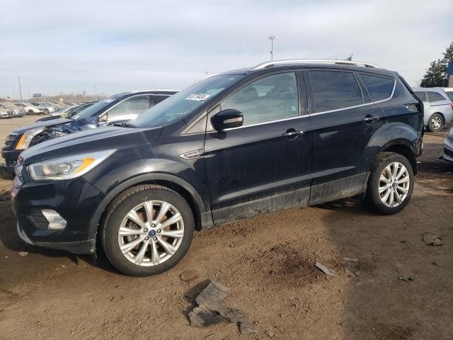 Obraz 1 z 2017 FORD ESCAPE TITANIUM 2017 z VIN 1FMCU0J94HUD08321
