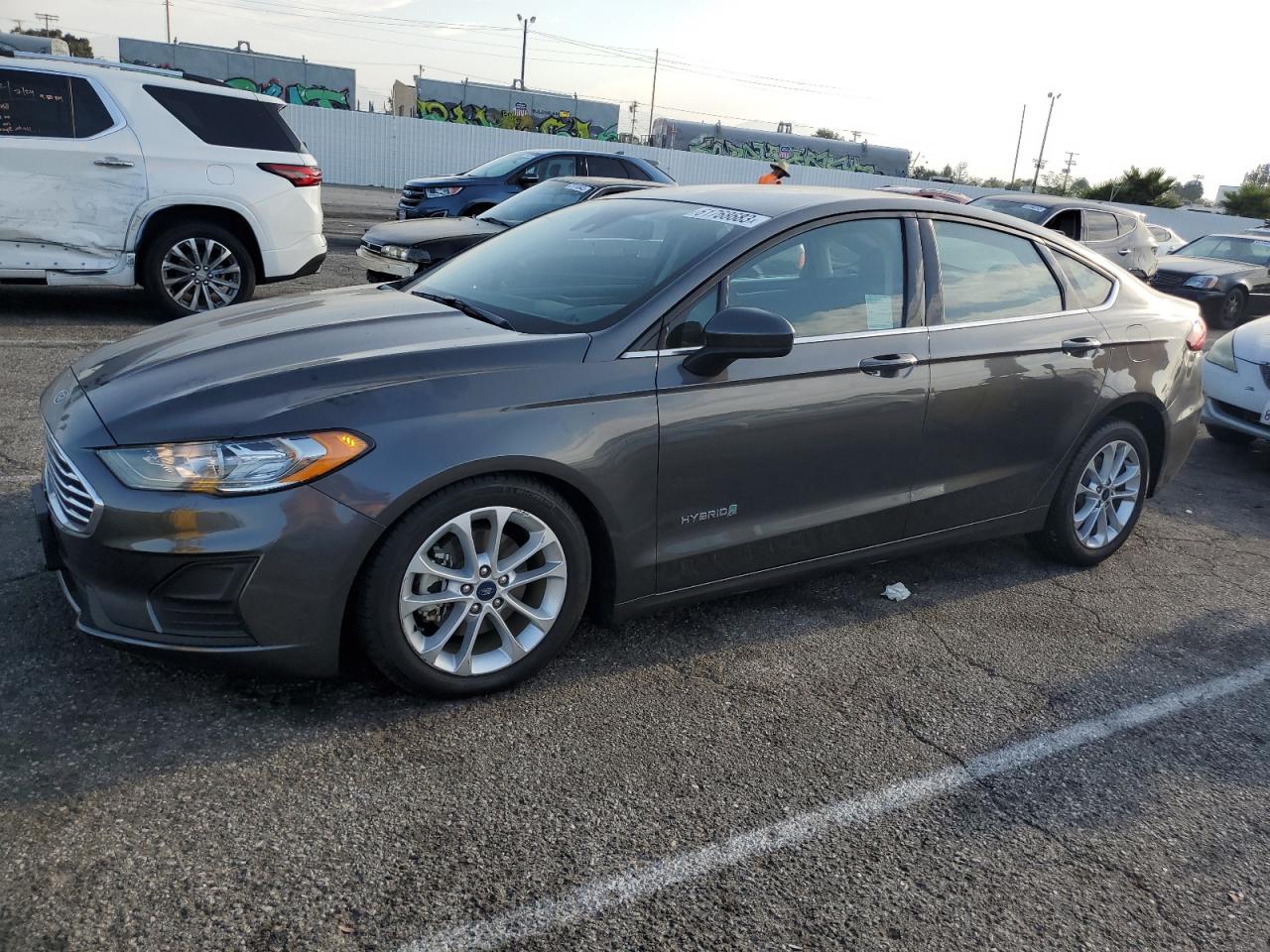 Image 1 of 2019 FORD FUSION SE 2019 with VIN 3FA6P0LU9KR200520
