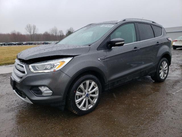 Obraz 1 z 2017 FORD ESCAPE TITANIUM 2017 z VIN 1FMCU9J97HUD37512