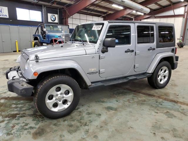 Image 1 of 2014 JEEP WRANGLER UNLIMITED SAHARA 2014 with VIN 1C4HJWEG7EL136219