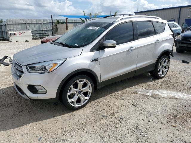 Obraz 1 z 2017 FORD ESCAPE TITANIUM 2017 z VIN 1FMCU9J9XHUC72929