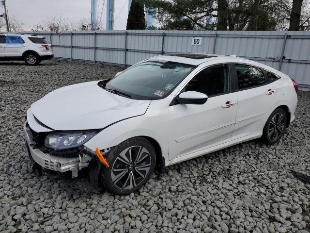 Obraz 1 z 2017 HONDA CIVIC EX 2017 z VIN 2HGFC1F35HH656776