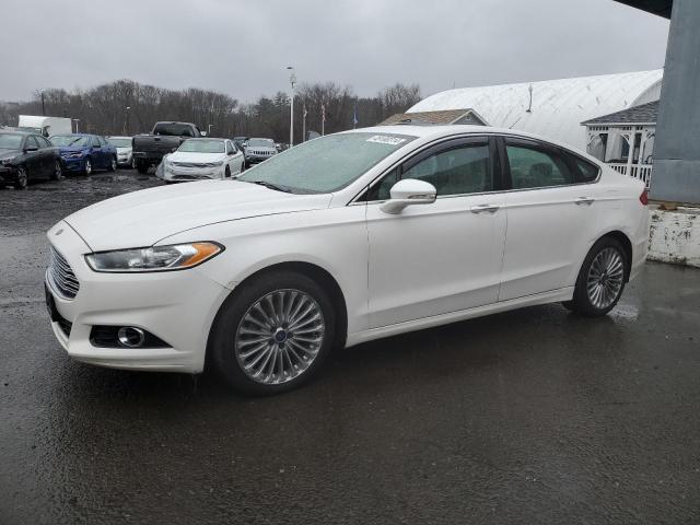 Obraz 1 z 2016 FORD FUSION TITANIUM 2016 z VIN 3FA6P0K9XGR400875