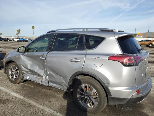 Изображение 2 2018 TOYOTA RAV4 HV LE 2018 с VIN JTMRJREV1JD157611
