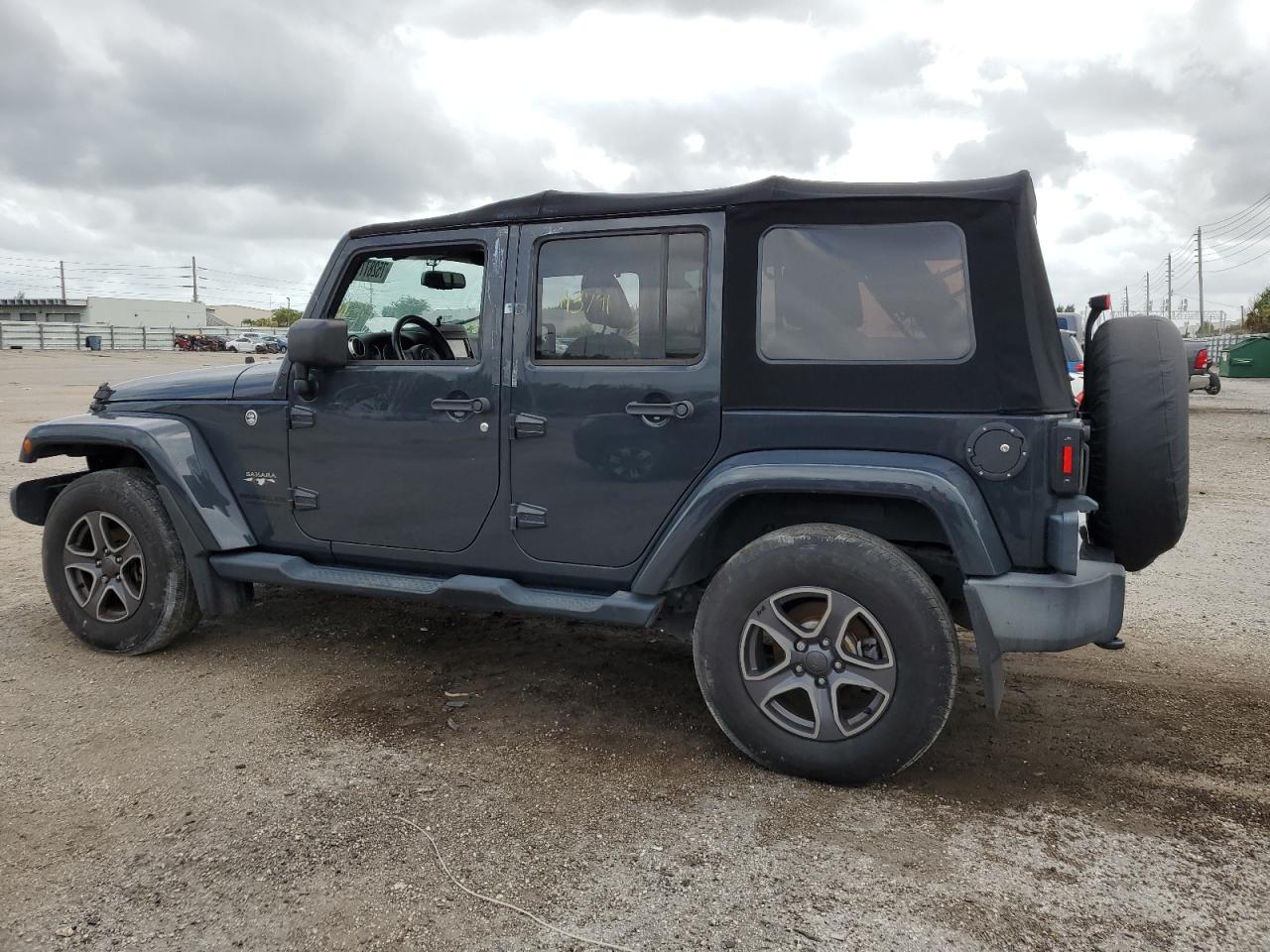 Изображение 2 Jeep Wrangler Unlimited Sahara 2016 с VIN 1C4BJWEG9GL221992