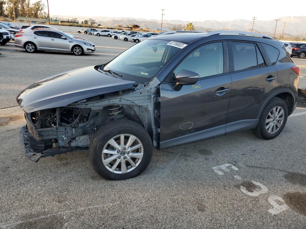 Image 1 of 2015 MAZDA CX-5 TOURING 2015 with VIN JM3KE2CY9F0490638