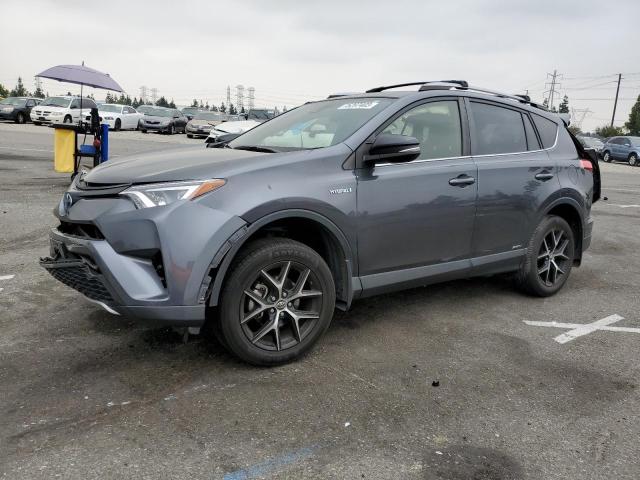 Image 1 of 2018 TOYOTA RAV4 HV SE 2018 with VIN JTMJJREV1JD255194