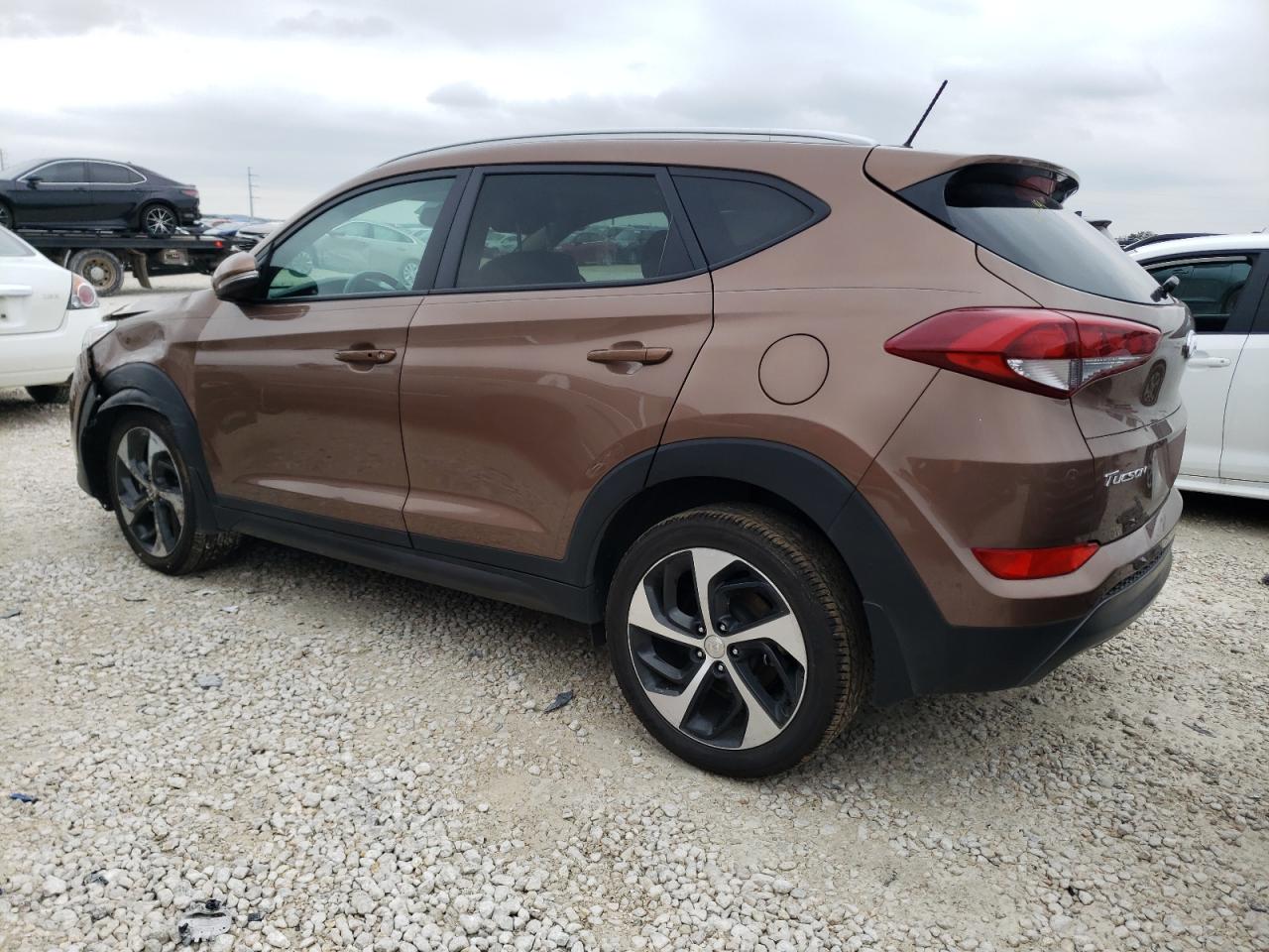 Изображение 2 2016 HYUNDAI TUCSON LIMITED 2016 с VIN KM8J33A27GU095295