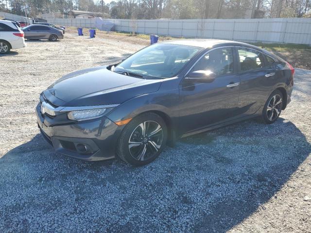 Obraz 1 z 2018 HONDA CIVIC TOURING 2018 z VIN JHMFC1F9XJX029784