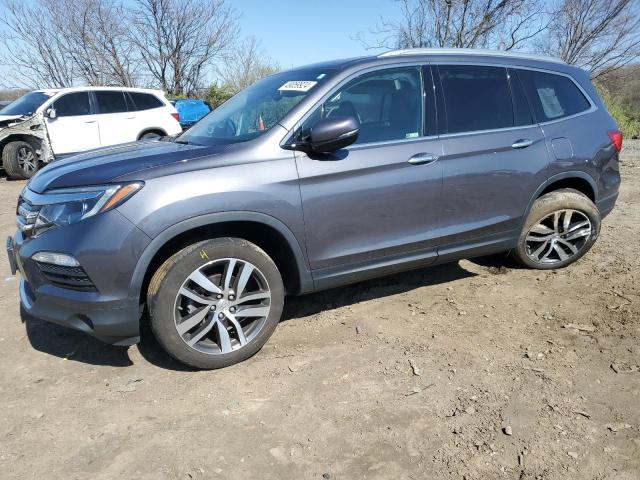 Изображение 1 2018 HONDA PILOT TOURING 2018 с VIN 5FNYF6H98JB008132
