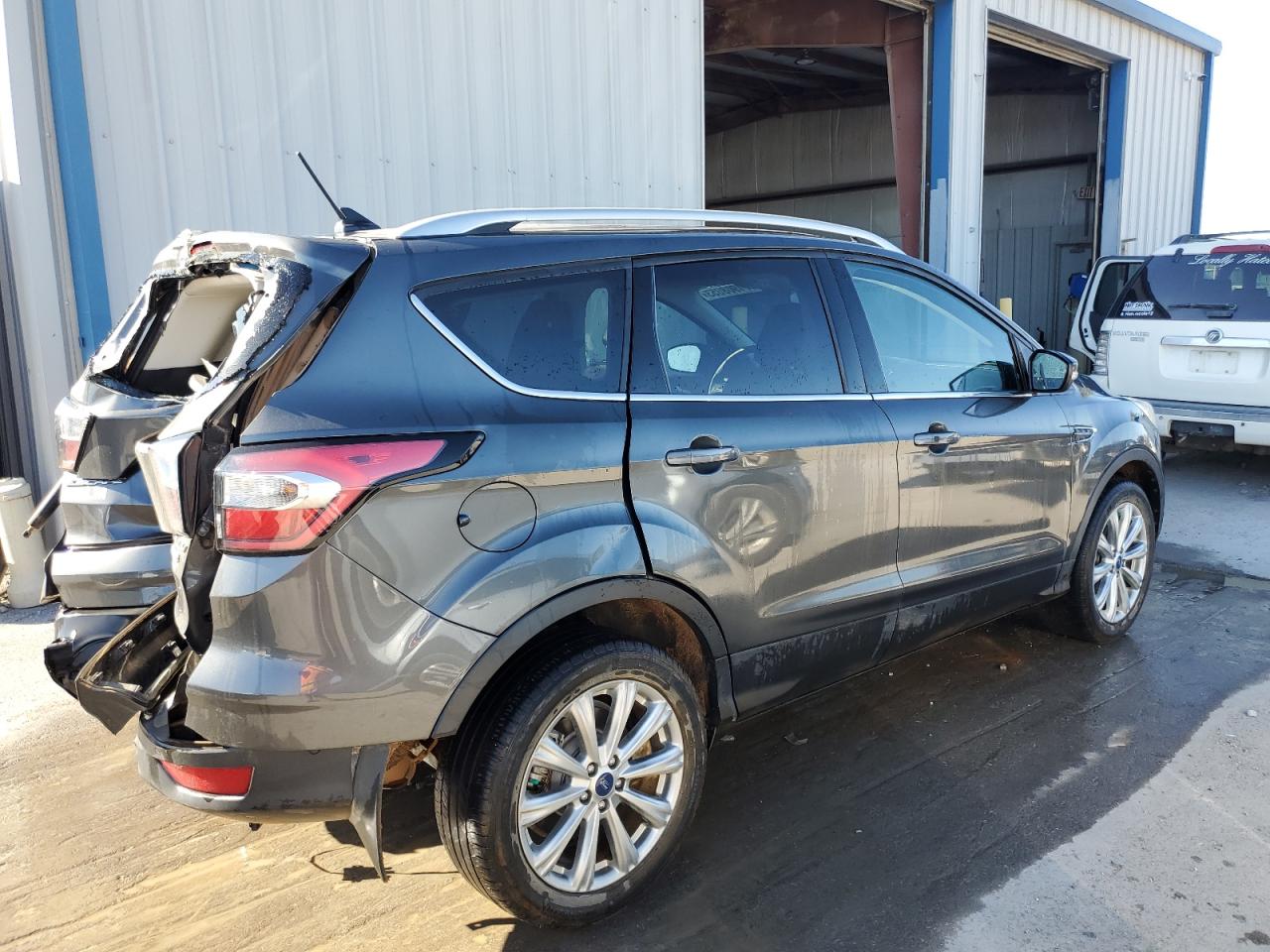 Изображение 3 2018 FORD ESCAPE TITANIUM 2018 с VIN 1FMCU9J96JUA14946