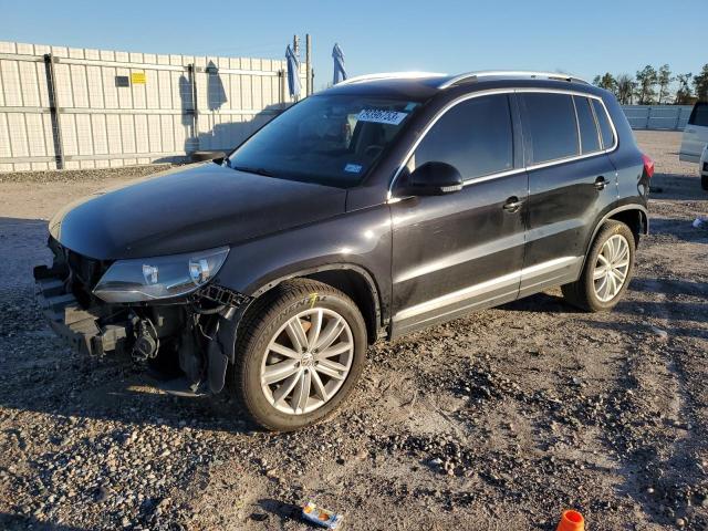 Image 1 of 2014 VOLKSWAGEN TIGUAN S 2014 with VIN WVGAV3AX4EW624936