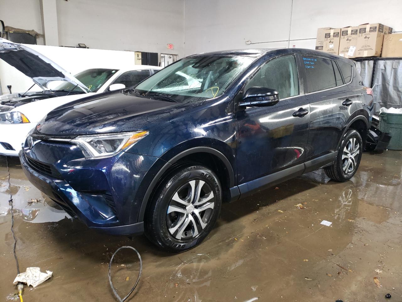 Image 1 of 2018 TOYOTA RAV4 LE 2018 with VIN 2T3BFREVXJW727031