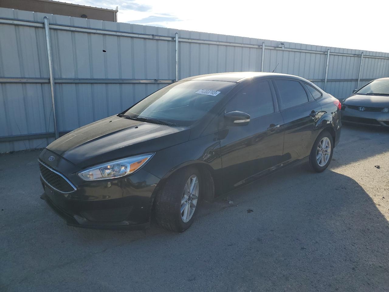 Image 1 of 2015 FORD FOCUS SE 2015 with VIN 1FADP3F26FL337034