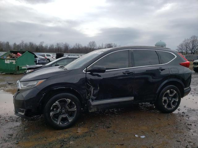 Image 1 of 2019 HONDA CR-V TOURING 2019 with VIN 7FARW2H97KE035597