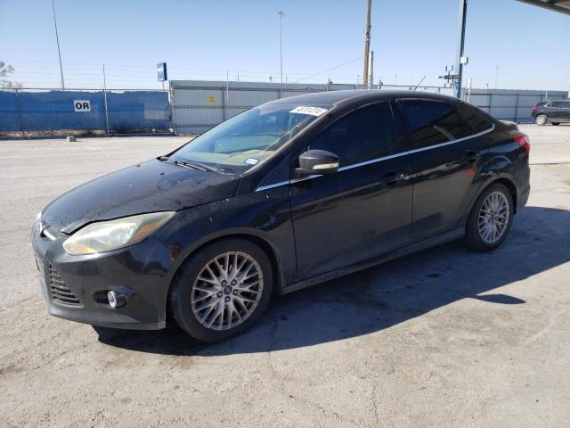 Image 1 of 2014 FORD FOCUS TITANIUM 2014 with VIN 1FADP3J24EL348815