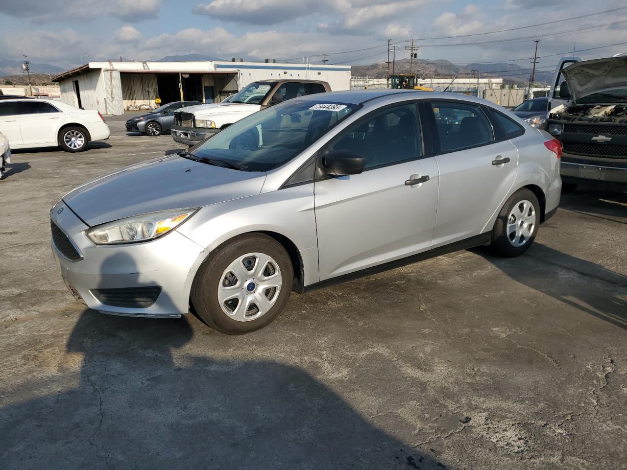 Image 1 of 2015 FORD FOCUS S 2015 with VIN 1FADP3E28FL324559