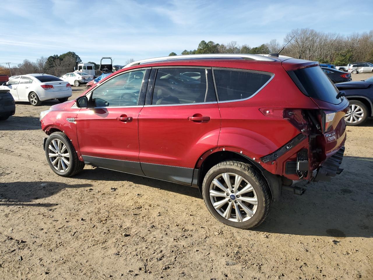 Изображение 2 2017 FORD ESCAPE TITANIUM 2017 с VIN 1FMCU9J93HUD72676