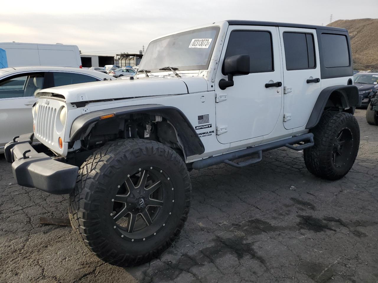 Image 1 of 2015 JEEP WRANGLER UNLIMITED SPORT 2015 with VIN 1C4BJWDG0FL536860