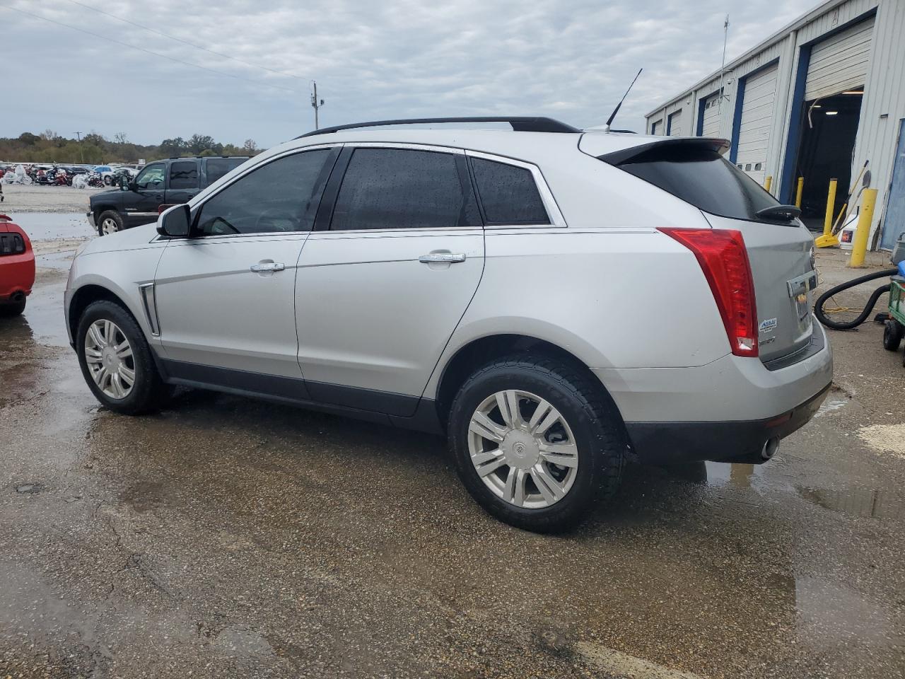 Image 2 of 2013 CADILLAC SRX  2013 with VIN 3GYFNAE30DS633689