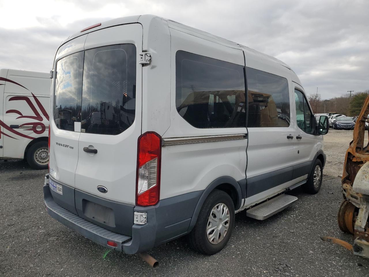 Image 3 of 2015 FORD TRANSIT T-150 2015 with VIN 1FMZK1CM8FKA55505