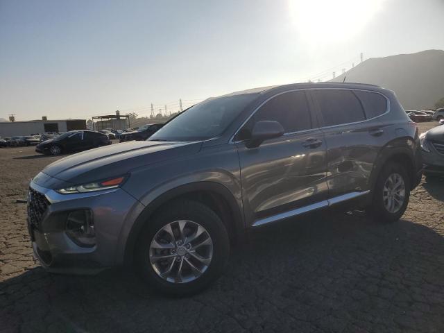 Image 1 of 2019 HYUNDAI SANTA FE SE 2019 with VIN 5NMS23AD2KH104644