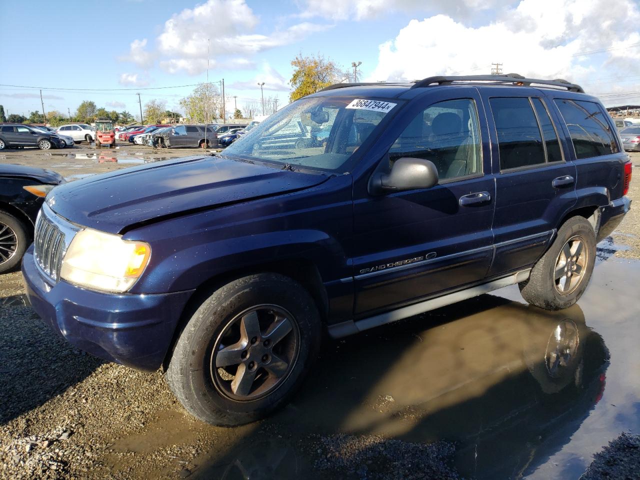 Image 1 of 2004 JEEP GRAND CHEROKEE OVERLAND 2004 with VIN 1J8GX68J14C205074