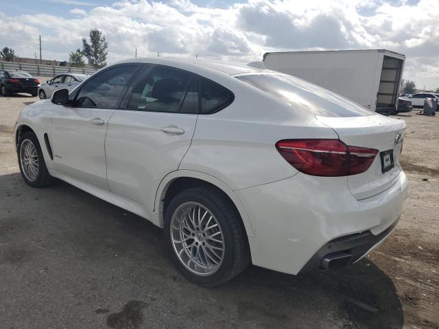 Изображение 2 2018 BMW X6 XDRIVE35I 2018 с VIN 5UXKU2C55J0X51028