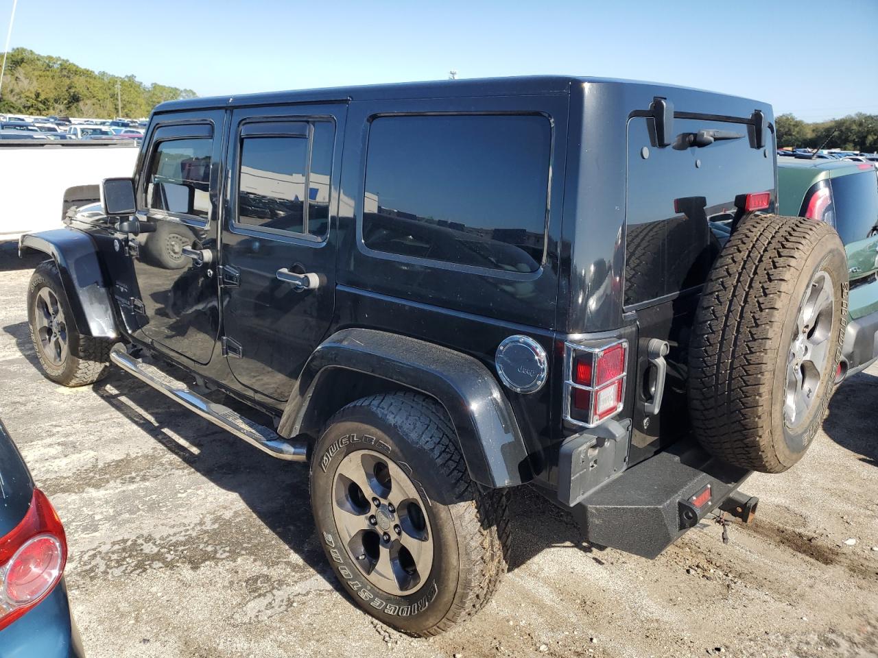Image 2 of 2016 JEEP WRANGLER UNLIMITED SAHARA 2016 with VIN 1C4BJWEG6GL311777