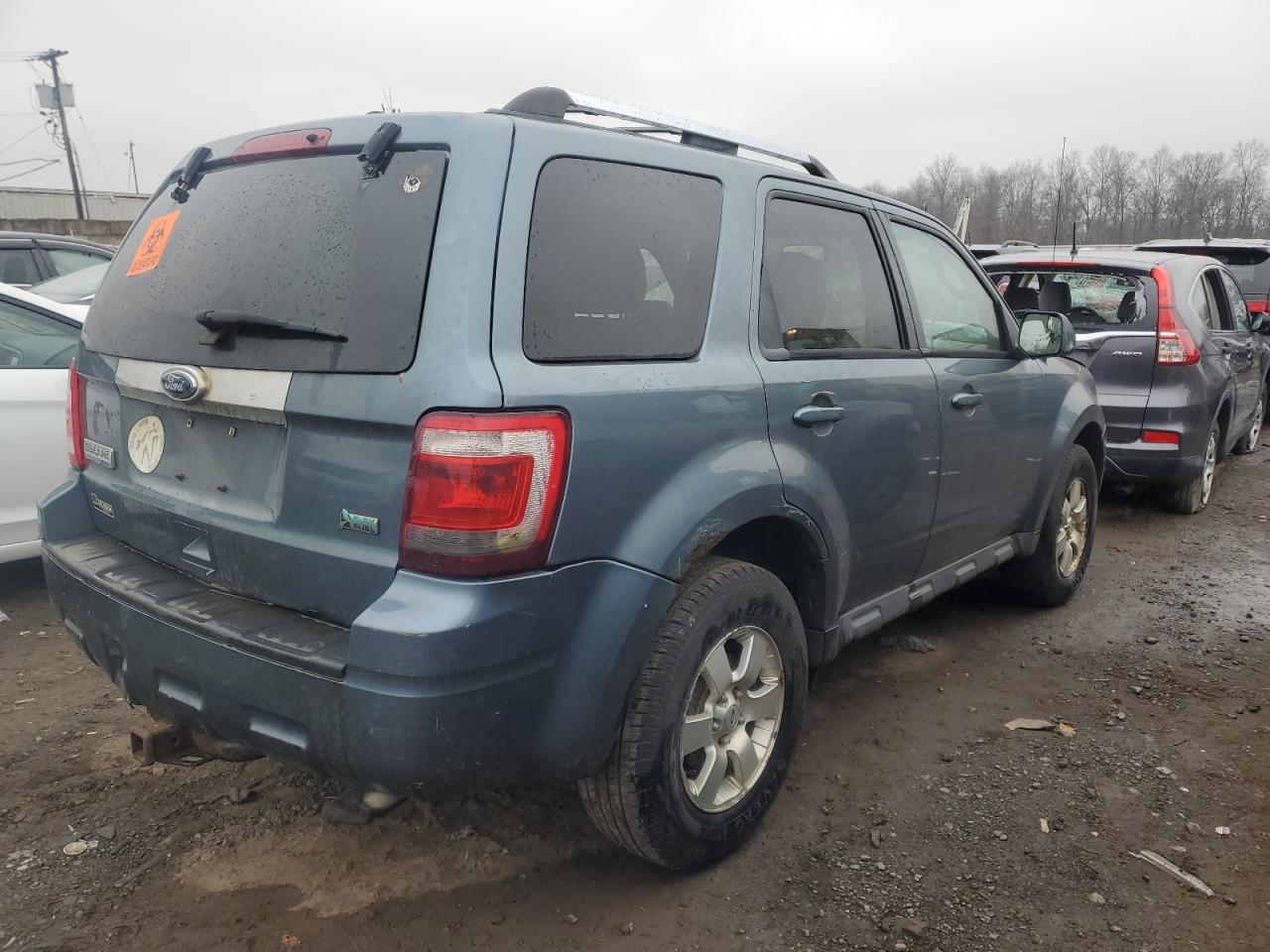 Image 3 of 2010 FORD ESCAPE LIMITED 2010 with VIN 1FMCU9EG2AKD15976