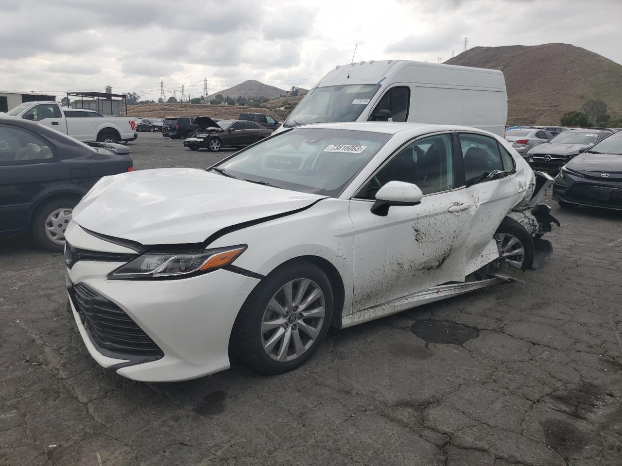 Image 1 of 2020 TOYOTA CAMRY LE 2020 with VIN 4T1C11AK4LU927849