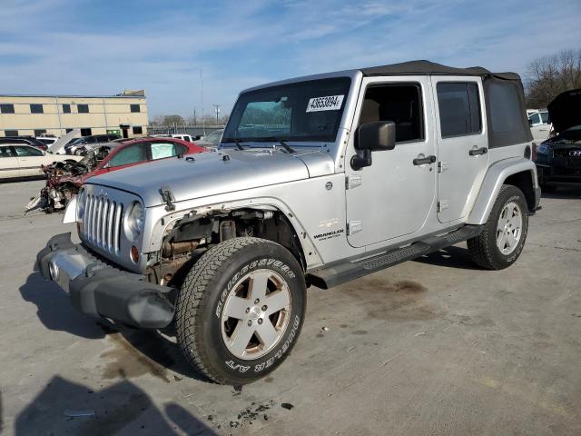 Image 1 of 2010 JEEP WRANGLER UNLIMITED SAHARA 2010 with VIN 1J4HA5H18AL174242