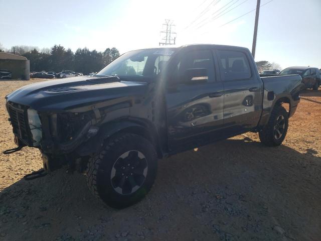 Image 1 of 2019 RAM 1500 REBEL 2019 with VIN 1C6RRELT6KN579587