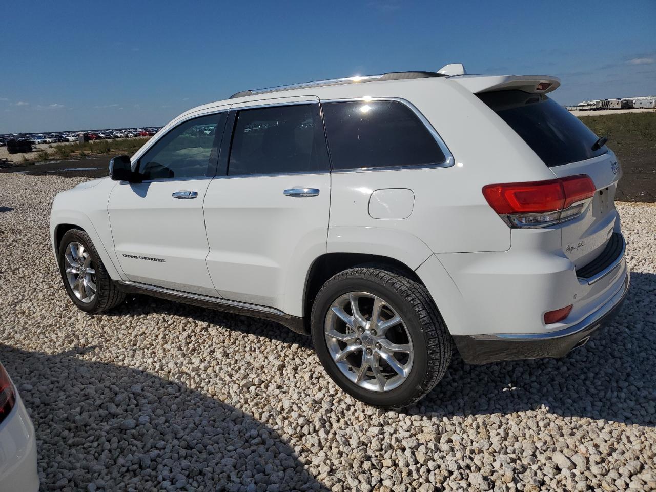 Изображение 2 2014 JEEP GRAND CHEROKEE SUMMIT 2014 с VIN 1C4RJEJT7EC405045