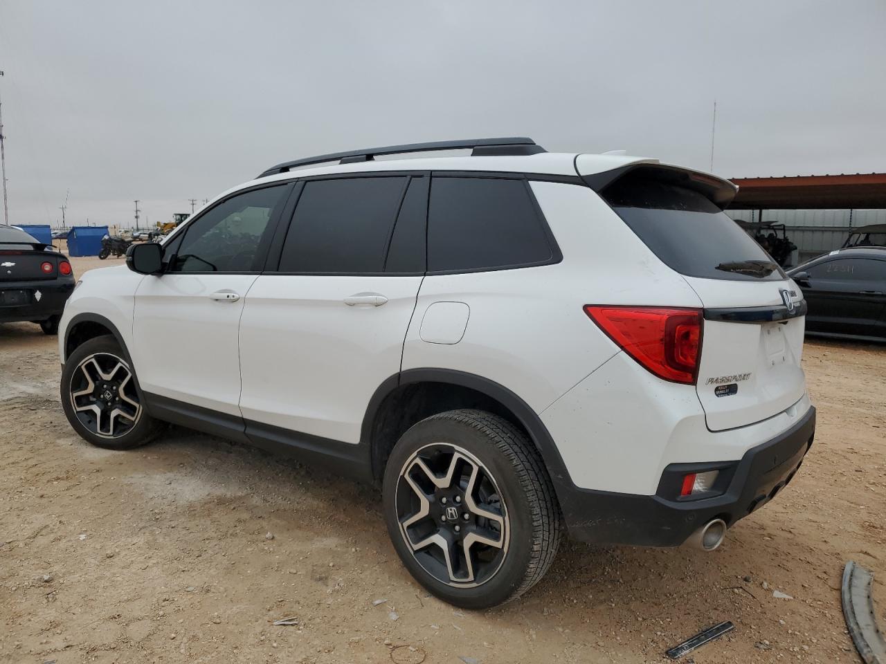 Изображение 2 2023 HONDA PASSPORT ELITE 2023 с VIN 5FNYF8H02PB029855