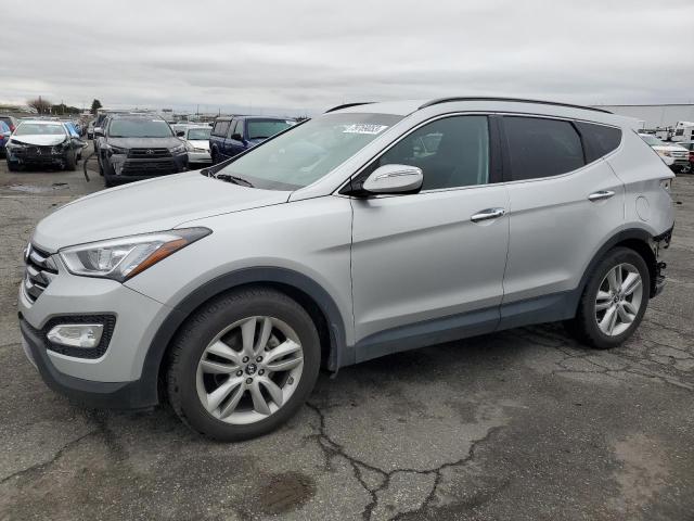 Image 1 of 2014 Hyundai Santa Fe 2014 with VIN 5XYZUDLA3EG221472