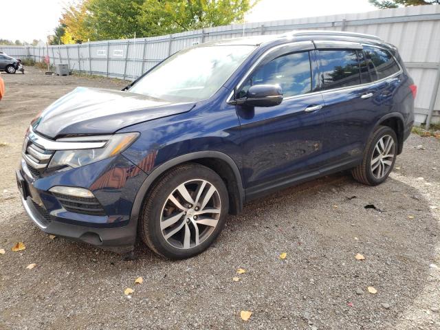 Obraz 1 z Honda Pilot Touring 2016 z VIN 5FNYF6H99GB503240