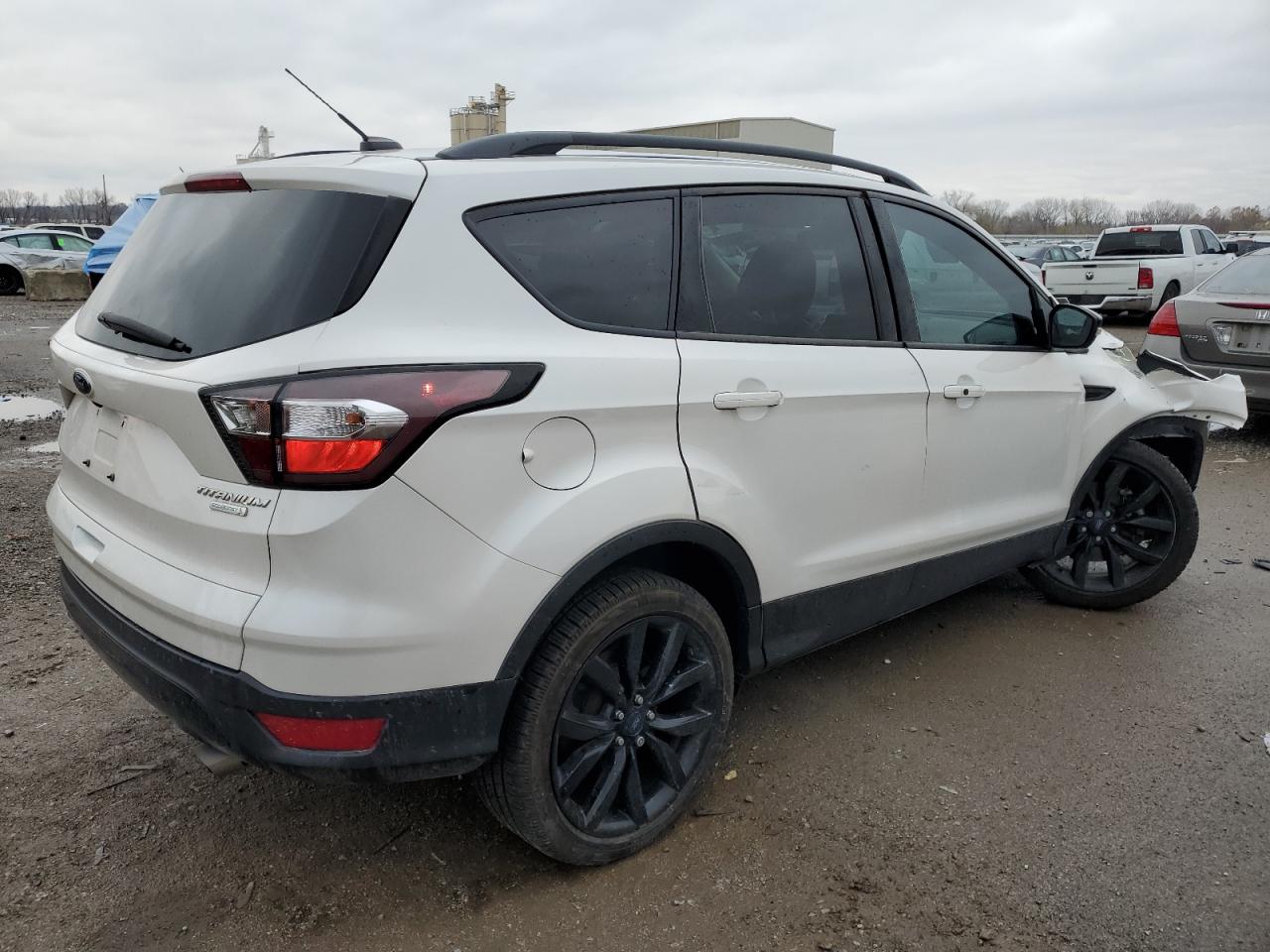 Изображение 3 2017 FORD ESCAPE TITANIUM 2017 с VIN 1FMCU0J90HUC49834