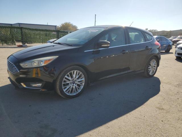 Image 1 of 2015 FORD FOCUS TITANIUM 2015 with VIN 1FADP3N24FL247317