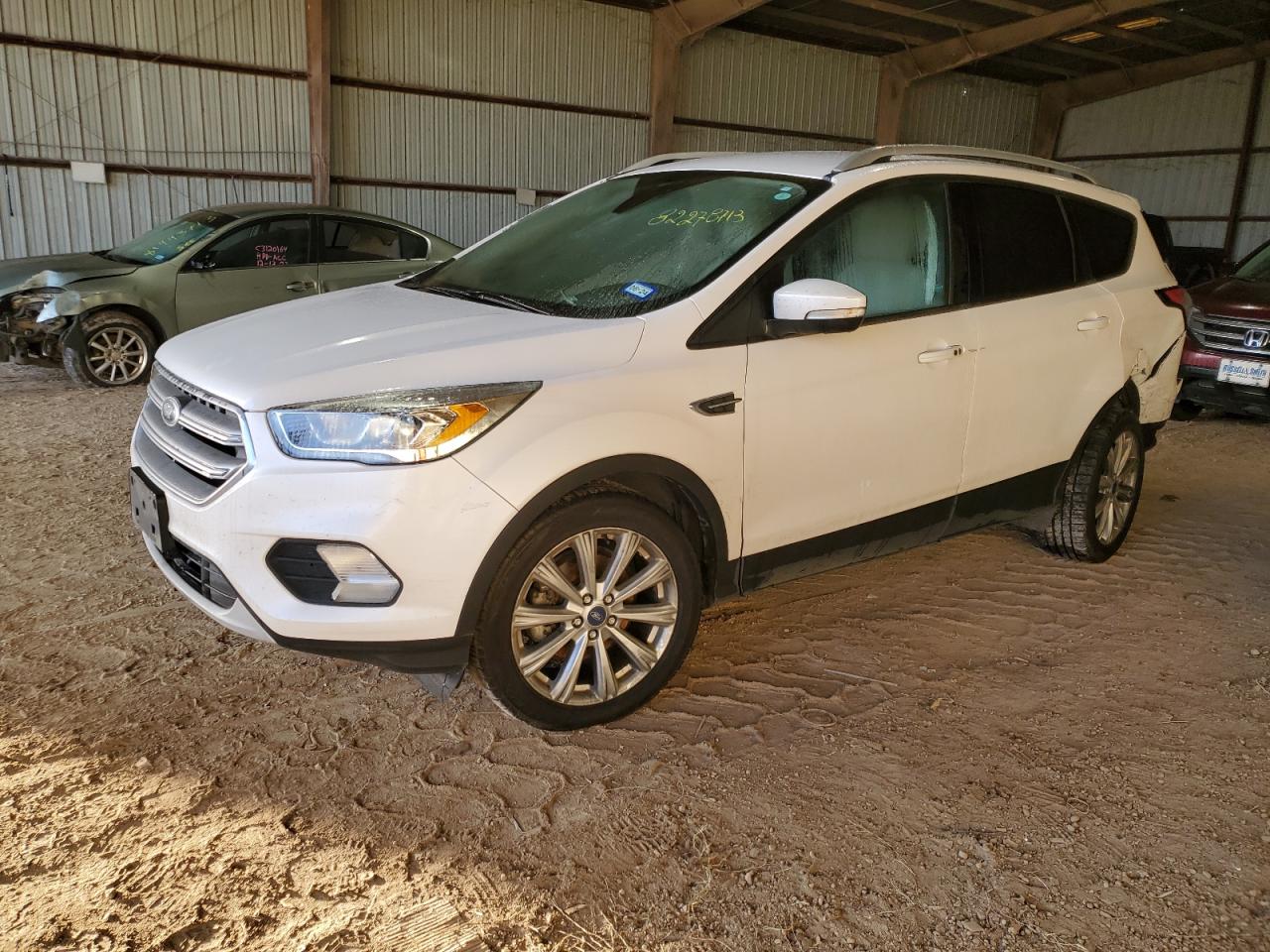 Obraz 1 z 2017 FORD ESCAPE TITANIUM 2017 z VIN 1FMCU0JD4HUD65946