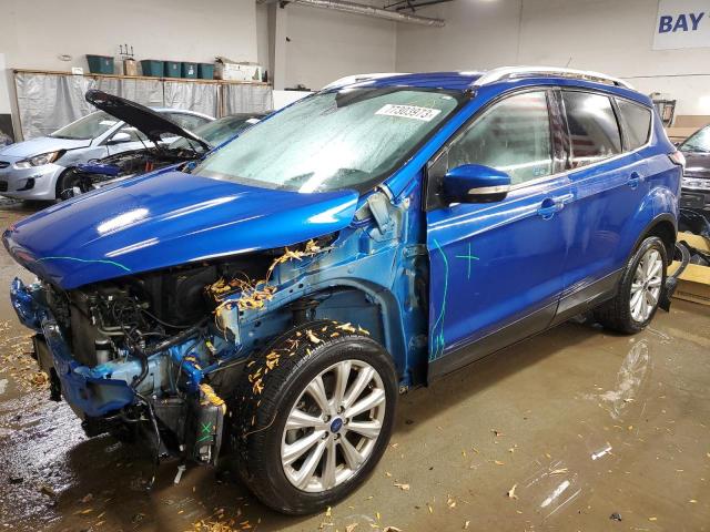 Image 1 of 2017 FORD ESCAPE TITANIUM 2017 with VIN 1FMCU9J94HUC89824