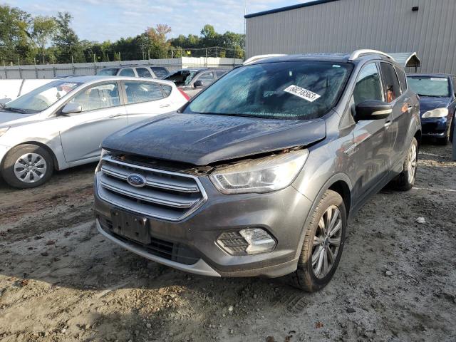 Image 1 of 2017 FORD ESCAPE TITANIUM 2017 with VIN 1FMCU9J91HUE18151