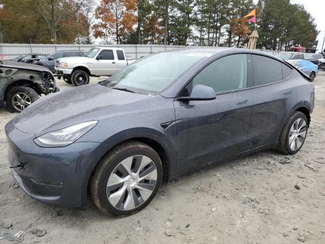 Image 1 of Tesla Model Y 2022 with VIN 7SAYGDEE9NF364486