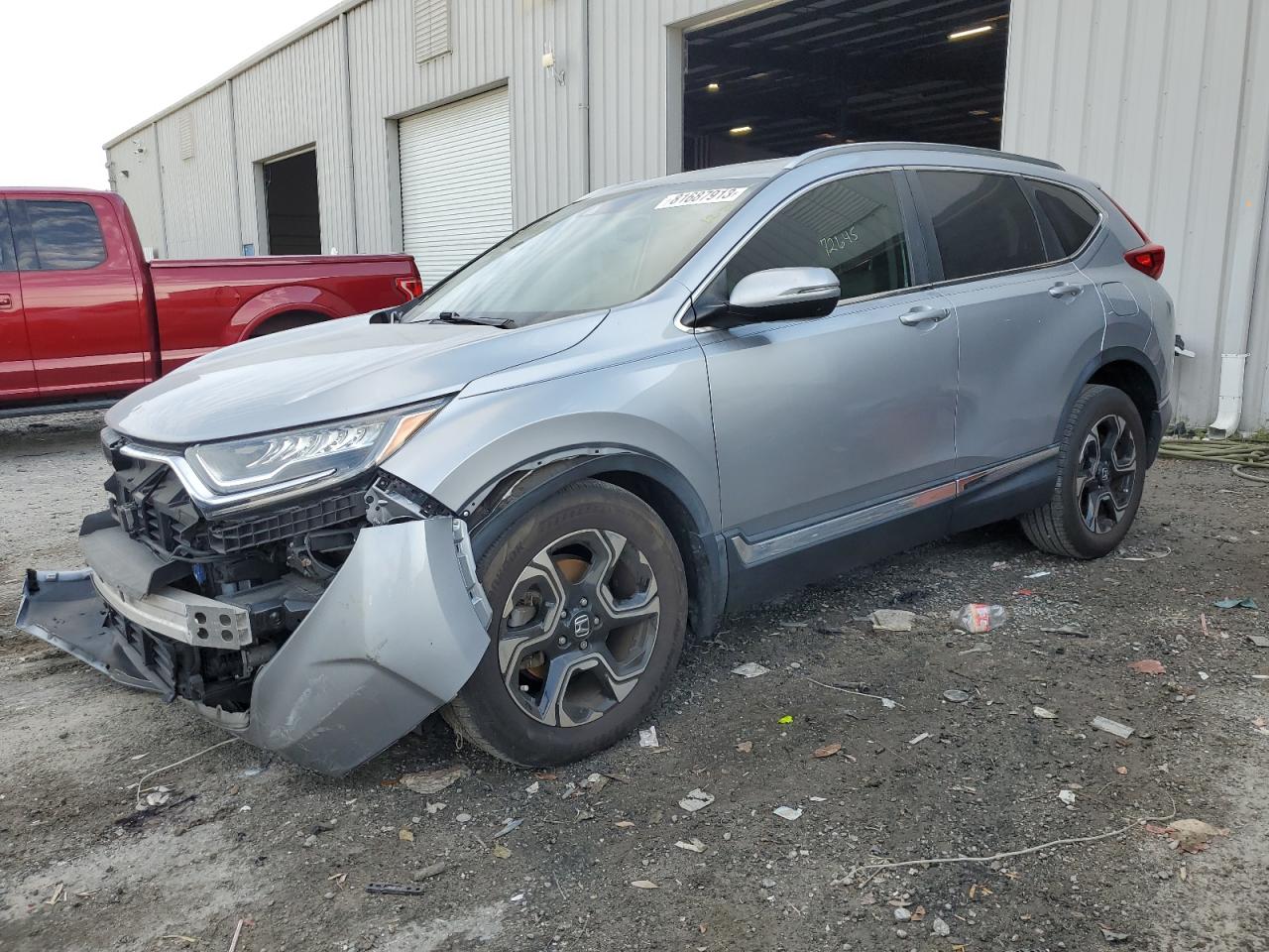 Image 1 of 2018 HONDA CR-V TOURING 2018 with VIN 7FARW2H97JE041737